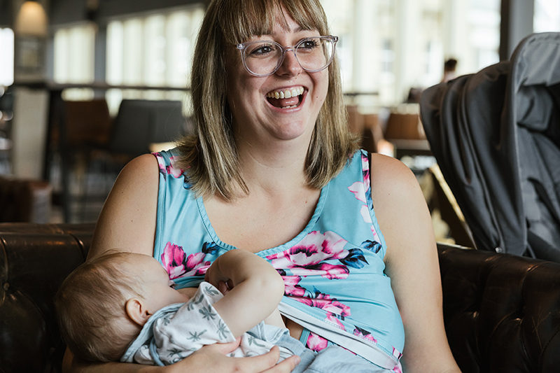 A woman breastfeeding a baby